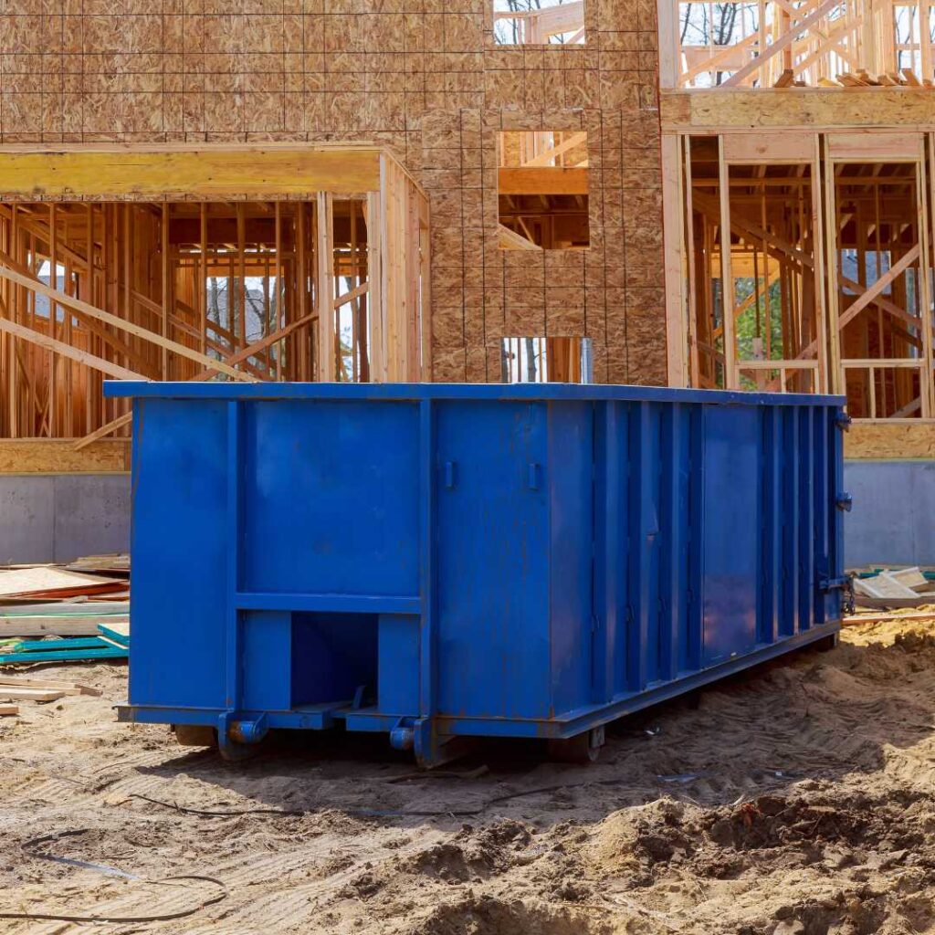 roll-off dumpster in front of construction site
